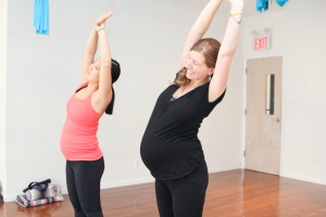 Side stretch during prenatal yoga class shoot, 4/18/14